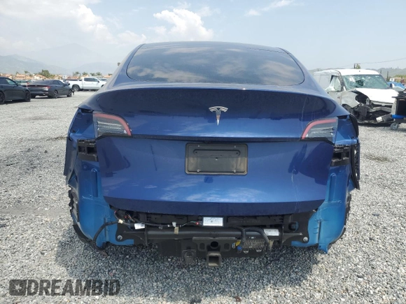 2024 Tesla Model Y z VIN 7SAYGDED3RF006264, wystawiony jako Copart lot #55210365 z przebiegiem 19 394 mil mil oraz Szkoda całkowita • Salvage title. Historia ofert i sprzedaży dostępna na DreamBid. Obrazek 6.