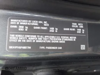 2023 Lucid Air Pure with VIN 50EA1PFA5PA007794, listed as a IAAI auction lot 42113156 with 5,052 mi miles. Bid and sale history available at carsss.com. Image 9.