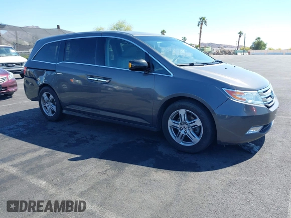 2013 Honda Odyssey Touring with VIN 5FNRL5H95DB045666, listed as a IAAI auction lot 42117219 with 50,715 mi miles and . Bid and sale history available at carsss.com. Image 13.