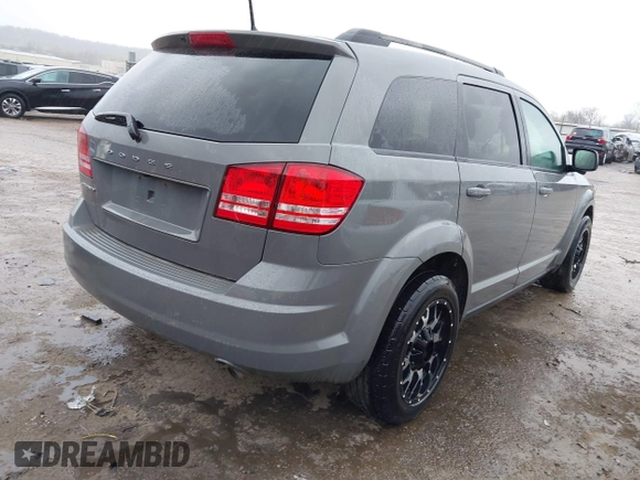 2019 Dodge Journey SE Value with VIN 3C4PDCAB5KT866156, listed as a IAAI auction lot 41910368 with 123,025 mi miles and . Bid and sale history available at DreamBid. Image 4.
