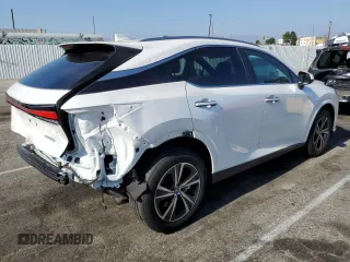 2023 Lexus RX with VIN 2T2BAMBA7PC018350, listed as a Copart auction lot 66975514 with 12,309 mi miles and Salvage Title. Bid and sale history available at carsss.com. Image 3.