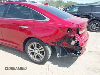 2018 Hyundai Sonata Sport with VIN 5NPE34AF3JH664160, listed as a IAAI auction lot 42072342 with 98,478 mi miles and . Bid and sale history available at carsss.com. Image 6.