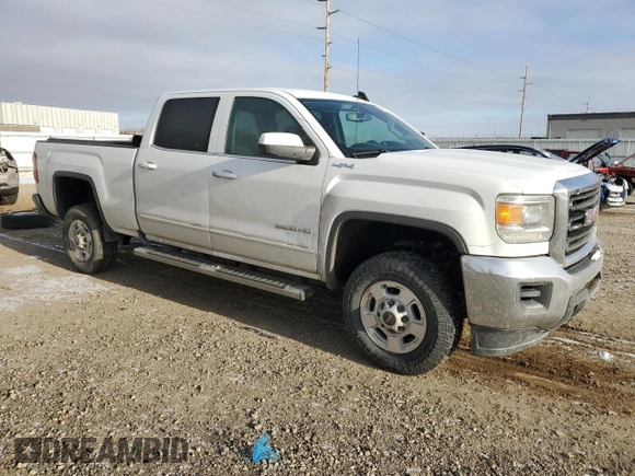 2016 GMC Sierra 2500HD SLE z VIN 1GT12SEGXGF265919, wystawiony jako Copart lot #82118884 z przebiegiem 113 066 mil mil oraz Szkoda całkowita • Salvage title. Historia ofert i sprzedaży dostępna na DreamBid. Obrazek 4.