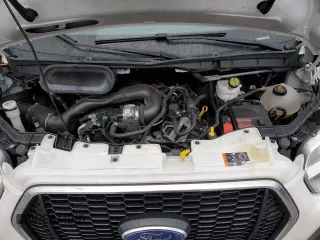 2021 Ford Transit Cargo with VIN 1FTBR1Y84MKA43992, listed as a Copart auction lot 54079785 with 66,124 mi miles and Salvage Title. Bid and sale history available at carsss.com. Image 12.