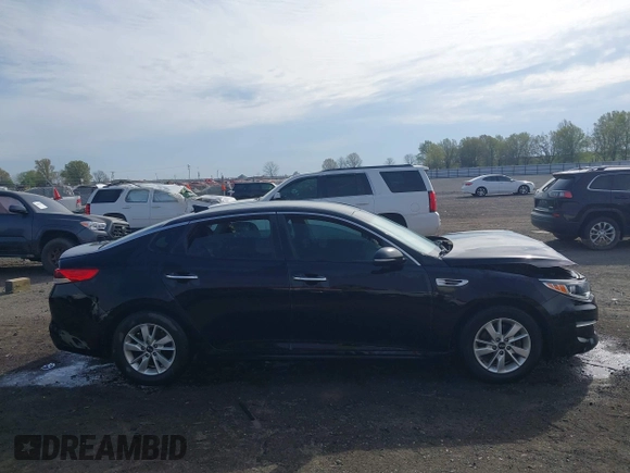 2016 Kia Optima LX with VIN 5XXGT4L35GG039310, listed as a IAAI auction lot 41910960 with 91,662 mi miles. Bid and sale history available at carsss.com. Image 13.