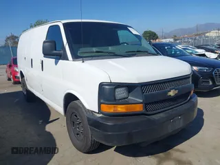 2015 Chevrolet Express Cargo Van with VIN 1GCWGFCF7F1242862, listed as a IAAI auction lot 42072812 with 311,197 mi miles. Bid and sale history available at carsss.com. Image 1.