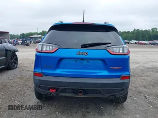 2019 Jeep Cherokee Trailhawk with VIN 1C4PJMBX0KD141577, listed as a IAAI auction lot 42413454 with 122,386 mi miles and . Bid and sale history available at DreamBid. Image 16.