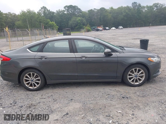 2017 Ford Fusion SE z VIN 3FA6P0HD6HR174945, wystawiony jako IAAI lot #42416548 z przebiegiem 128 410 mil mil oraz . Historia ofert i sprzedaży dostępna na DreamBid. Obrazek 13.