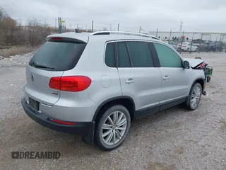 2016 Volkswagen Tiguan SEL z VIN WVGBV7AX3GW594729, wystawiony jako IAAI lot #41233805 z przebiegiem 92 997 mil mil oraz . Historia ofert i sprzedaży dostępna na DreamBid. Obrazek 4.