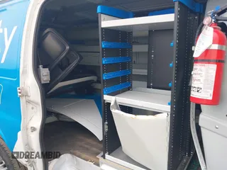 2015 Chevrolet Express Cargo Van with VIN 1GCWGFCF6F1152795, listed as a IAAI auction lot 41912147 with 101,265 mi miles. Bid and sale history available at carsss.com. Image 8.