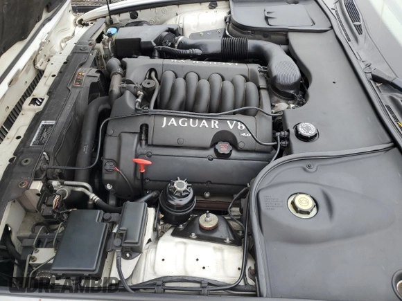 1999 Jaguar XJ with VIN SAJHX1040XC864208, listed as a Copart auction lot 59748585 with 130,577 mi miles and Clean title. Bid and sale history available at DreamBid. Image 11.