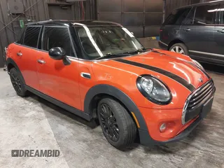 2019 MINI Hardtop 4 Door Cooper z VIN WMWXU1C58K2F82579, wystawiony jako IAAI lot #42417562 z przebiegiem 45 915 mil mil oraz . Historia ofert i sprzedaży dostępna na DreamBid. Obrazek 1.