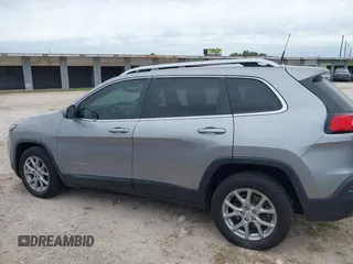 2018 Jeep Cherokee Latitude with VIN 1C4PJLCX4JD559096, listed as a IAAI auction lot 41925282 with 127,488 mi miles and . Bid and sale history available at DreamBid. Image 14.