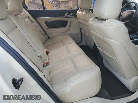 2014 Lincoln MKS with VIN 1LNHL9DKXEG612758, listed as a Copart auction lot 53230065 with 98,863 mi miles and Salvage Title. Bid and sale history available at carsss.com. Image 10.
