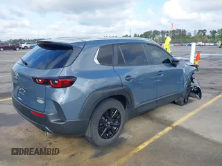 2023 Mazda CX-50 S Preferred Plus with VIN 7MMVABCM3PN122068, listed as a IAAI auction lot 41921767 with 32,293 mi miles and . Bid and sale history available at DreamBid. Image 4.