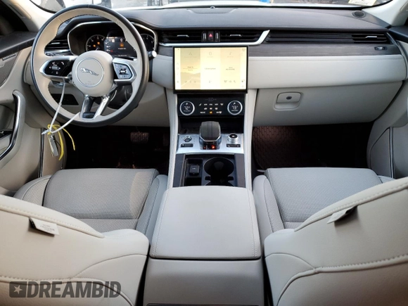 2023 Jaguar F-Pace S with VIN SADCJ2EX0PA711041, listed as a Copart auction lot 87373724 with 9,479 mi miles and Salvage title. Bid and sale history available at DreamBid. Image 8.