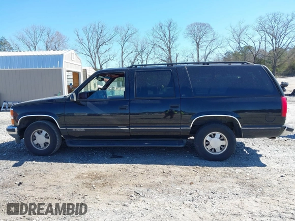 1999 Chevrolet Suburban with VIN 3GNEC16R0XG137834, listed as a IAAI auction lot 41853492 with 296,147 mi miles and . Bid and sale history available at DreamBid. Image 14.