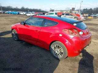 2012 Hyundai Veloster w/Gray Int with VIN KMHTC6AD7CU056647, listed as a IAAI auction lot 41434535 with 68,691 mi miles. Bid and sale history available at carsss.com. Image 3.