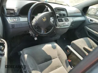 2006 Honda Odyssey EX z VIN 5FNRL38416B122268, wystawiony jako Copart lot #58969785 z przebiegiem 167 991 mil mil oraz Szkoda całkowita • Salvage title. Historia ofert i sprzedaży dostępna na DreamBid. Obrazek 8.