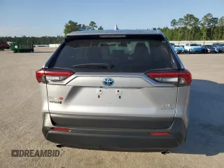 2024 Toyota RAV4 Hybrid XLE Premium z VIN 2T3B6RFV0RW074218, wystawiony jako Copart lot #56917295 z przebiegiem 14 969 mil mil oraz Szkoda całkowita • Salvage title. Historia ofert i sprzedaży dostępna na DreamBid. Obrazek 6.