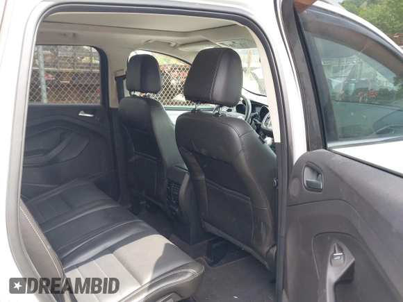 2016 Ford Escape Titanium with VIN 1FMCU9J92GUA71444, listed as a IAAI auction lot 42334603 with 79,780 mi miles and . Bid and sale history available at DreamBid. Image 8.