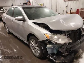 2014 Toyota Camry L with VIN 4T4BF1FK4ER412428, listed as a IAAI auction lot 41573095 with 130,000 mi miles. Bid and sale history available at carsss.com. Image 1.