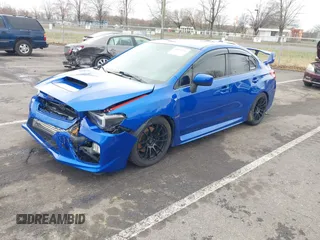 2016 Subaru WRX with VIN JF1VA1B64G9829384, listed as a IAAI auction lot 41811036 with 108,450 mi miles. Bid and sale history available at carsss.com. Image 2.