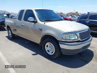 1999 Ford F-150 z VIN 1FTRX07W1XKB63882, wystawiony jako IAAI lot #42830926 z przebiegiem Nie podano mil oraz . Historia ofert i sprzedaży dostępna na DreamBid. Obrazek 1.