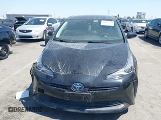 2019 Toyota Prius L Eco with VIN JTDKARFU0K3087064, listed as a IAAI auction lot 41986365 with 81,735 mi miles. Bid and sale history available at carsss.com. Image 12.