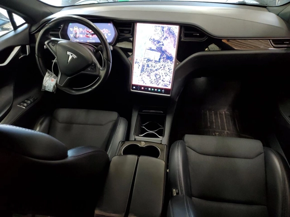 2018 Tesla Model S 75D z VIN 5YJSA1E28JF281649, wystawiony jako Copart lot #62399185 z przebiegiem 93 792 mil mil oraz Szkoda całkowita • Salvage title. Historia ofert i sprzedaży dostępna na DreamBid. Obrazek 8.