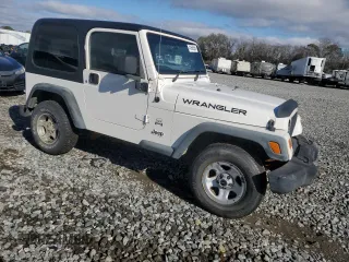 2006 Jeep Wrangler Sport Right Hand Drive with VIN 1J4F449S26P741397, listed as a Copart auction lot 41656585 with 205,683 mi miles and Clean Title. Bid and sale history available at carsss.com. Image 4.