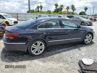 2013 Volkswagen CC Lux with VIN WVWRP7AN4DE568539, listed as a Copart auction lot 55122155 with 166,039 mi miles and Salvage title. Bid and sale history available at DreamBid. Image 3.