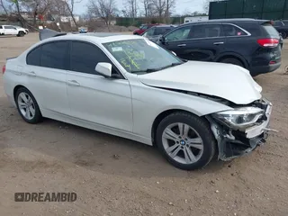 2018 BMW 3 Series 330i with VIN WBA8B9G59JNU99143, listed as a IAAI auction lot 41720368 with 59,633 mi miles. Bid and sale history available at carsss.com. Image 1.