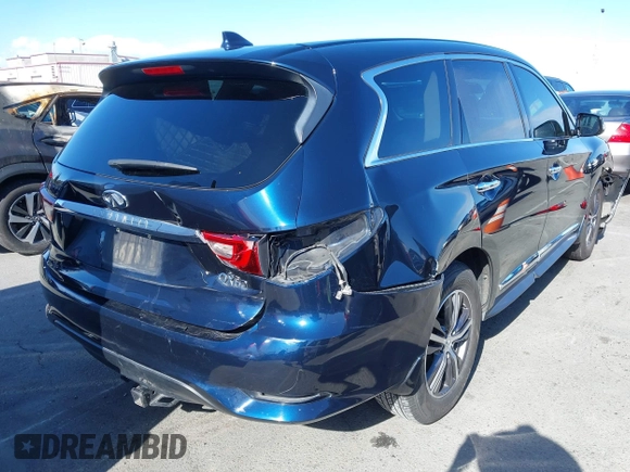 2019 Infiniti QX60 LUXE with VIN 5N1DL0MN9KC559199, listed as a IAAI auction lot 41931773 with 111,569 mi miles. Bid and sale history available at carsss.com. Image 4.