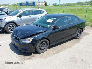 2012 Volkswagen Jetta Sedan SE w/Convenience & Sunroof with VIN 3VWDX7AJ4CM107290, listed as a IAAI auction lot 42142201 with 132,122 mi miles. Bid and sale history available at carsss.com. Image 2.