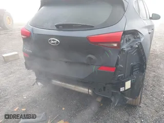 2019 Hyundai Tucson Value with VIN KM8J33A44KU995257, listed as a IAAI auction lot 41672206 with 63,090 mi miles. Bid and sale history available at carsss.com. Image 6.