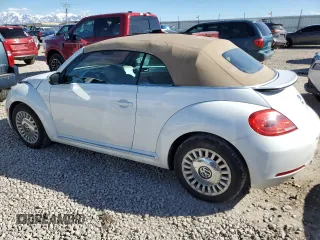 2014 Volkswagen Beetle 1.8T with VIN 3VW517AT4EM818949, listed as a Copart auction lot 49615915 with 103,682 mi miles and Salvage title. Bid and sale history available at DreamBid. Image 2.