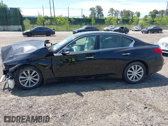 2015 Infiniti Q50 Premium z VIN JN1BV7AR4FM410949, wystawiony jako IAAI lot #42243917 z przebiegiem 56 552 mil mil oraz . Historia ofert i sprzedaży dostępna na DreamBid. Obrazek 14.