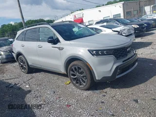 2022 Kia Sorento SX z VIN 5XYRKDLF6NG093083, wystawiony jako IAAI lot #42170584 z przebiegiem 60 848 mil mil oraz . Historia ofert i sprzedaży dostępna na DreamBid. Obrazek 1.