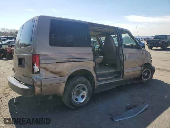 1998 Chevrolet Astro with VIN 1GNEL19W7WB182424, listed as a Copart auction lot 49575185 with 131,741 mi miles and Salvage Title. Bid and sale history available at carsss.com. Image 3.