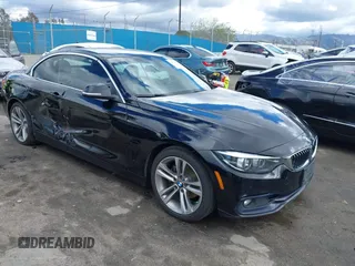 2018 BMW 4 Series 430i with VIN WBA4Z1C55JEC59897, listed as a IAAI auction lot 41774609 with 80,017 mi miles and . Bid and sale history available at DreamBid. Image 1.