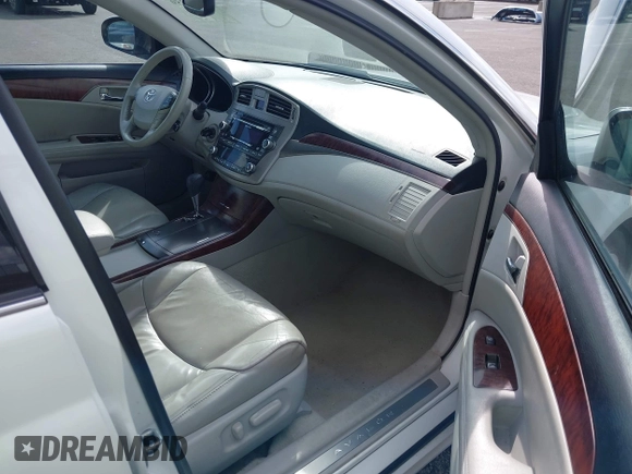 2011 Toyota Avalon with VIN 4T1BK3DB4BU371508, listed as a IAAI auction lot 41916559 with 203,667 mi miles and . Bid and sale history available at carsss.com. Image 5.