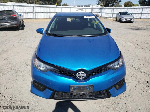 2016 Scion iM with VIN JTNKARJE2GJ509740, listed as a Copart auction lot 70890914 with 97,195 mi miles and Salvage Title. Bid and sale history available at carsss.com. Image 5.