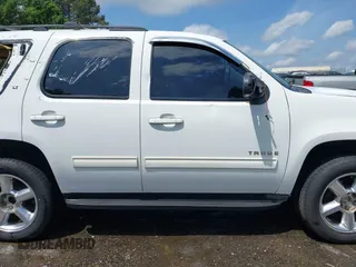 2012 Chevrolet Tahoe LT z VIN 1GNSCBE00CR176056, wystawiony jako IAAI lot #42091159 z przebiegiem 216 650 mil mil oraz . Historia ofert i sprzedaży dostępna na DreamBid. Obrazek 14.