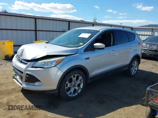 2013 Ford Escape SEL with VIN 1FMCU0H96DUA30733, listed as a IAAI auction lot 42737439 with 106,651 mi miles and . Bid and sale history available at DreamBid. Image 2.