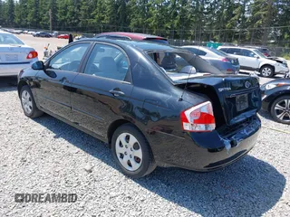 2009 Kia Spectra EX z VIN KNAFE221795624968, wystawiony jako IAAI lot #42406286 z przebiegiem 156 297 mil mil oraz . Historia ofert i sprzedaży dostępna na DreamBid. Obrazek 3.