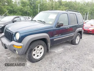 2003 Jeep Liberty Sport with VIN 1J4GL48K63W585973, listed as a IAAI auction lot 42235322 with 316,872 mi miles and . Bid and sale history available at DreamBid. Image 2.
