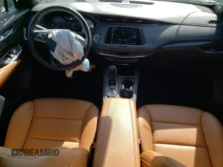 2021 Cadillac XT4 AWD Premium Luxury with VIN 1GYFZDR41MF002835, listed as a Copart auction lot 49384424 with 9,984 mi miles and Salvage Title. Bid and sale history available at carsss.com. Image 8.