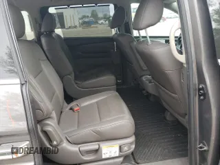 2014 Honda Odyssey Touring with VIN 5FNRL5H90EB014360, listed as a Copart auction lot 56699845 with 180,913 mi miles and Salvage title. Bid and sale history available at DreamBid. Image 11.