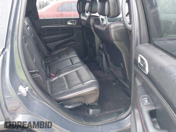 2018 Jeep Grand Cherokee Trailhawk with VIN 1C4RJFLG6JC320763, listed as a IAAI auction lot 41871683 with 115,417 mi miles and . Bid and sale history available at DreamBid. Image 8.